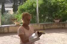 Bev Reading in the Garden of Gethsemane